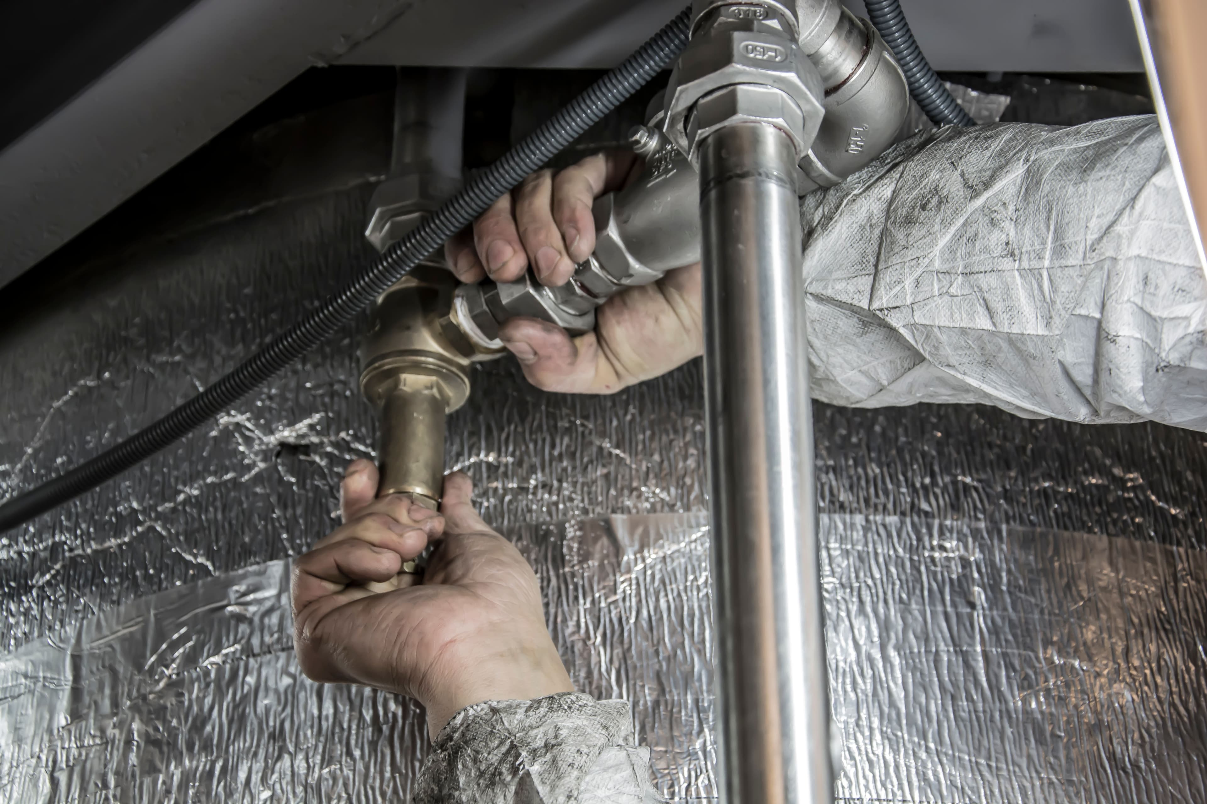 Placeholder - pipe fittings being installed on site
